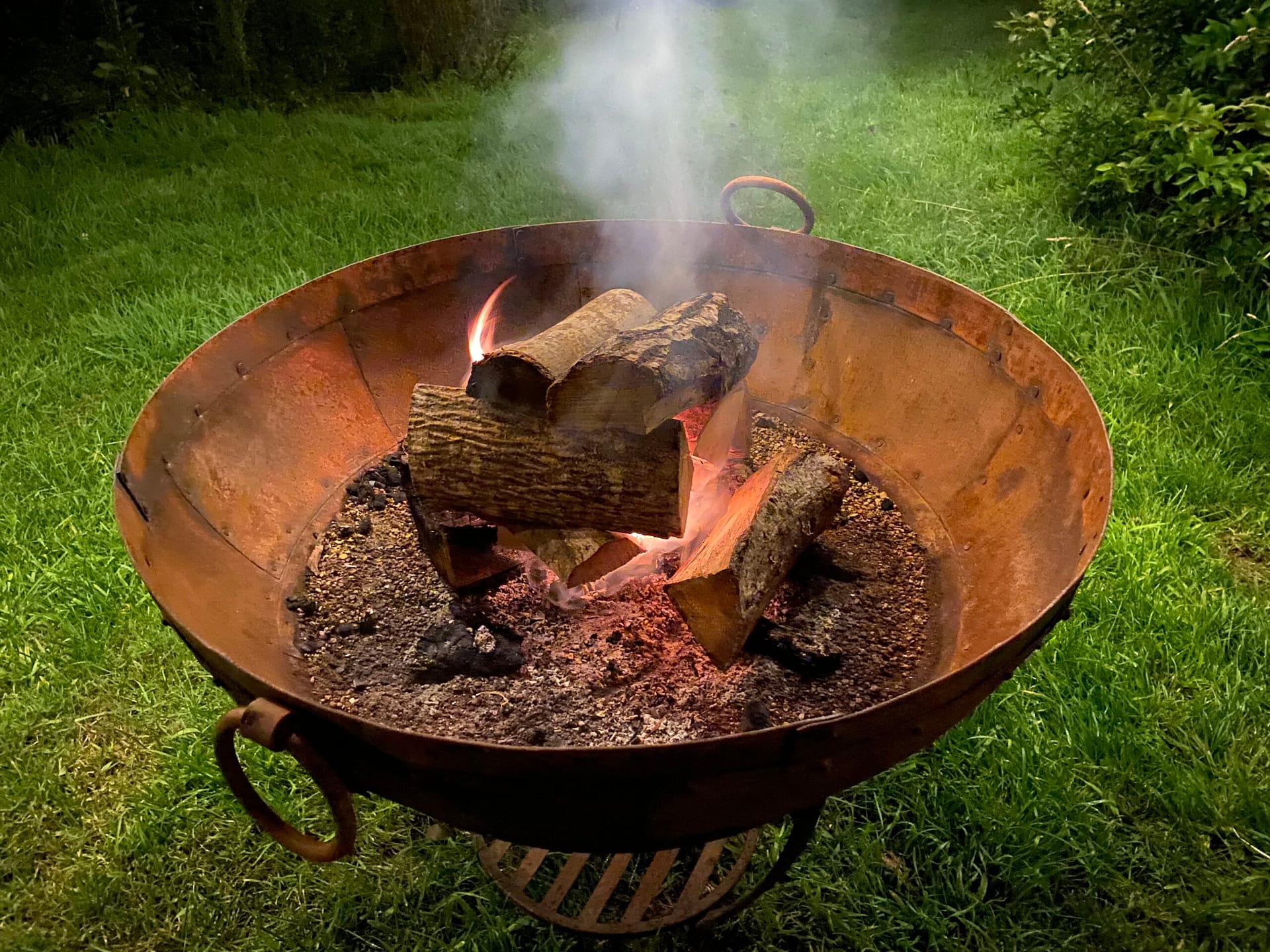 Kadai firebowl lit at Batcombe Vale Campsite for guest use